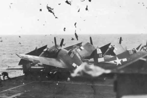 Check out this dramatic photo of an F6F smashing into 6 other parked Hellcats with pilots aboard
